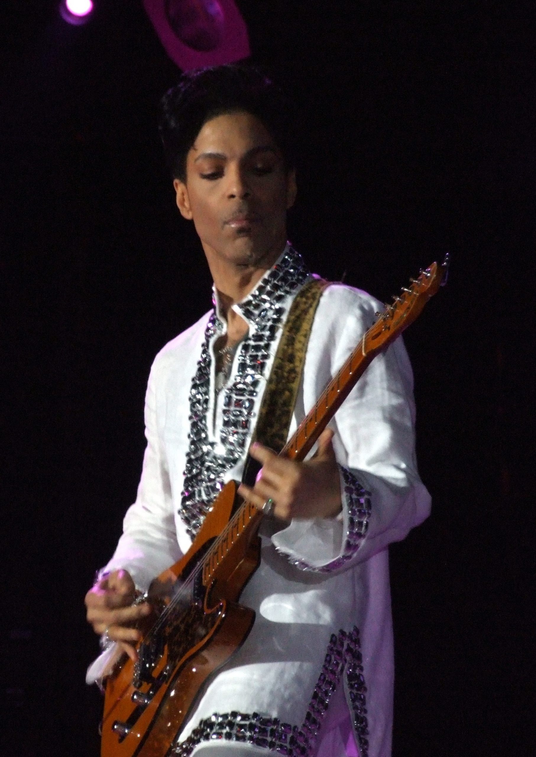 Prince playing guitar image